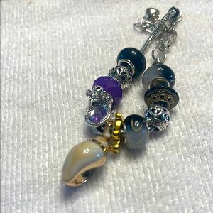 Elegant Silver and Gold Charm Bracelet